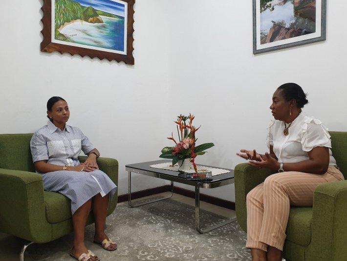 Minister Zialor eyeing women empowerment projects with Marsha Parcou, receives copy of her book